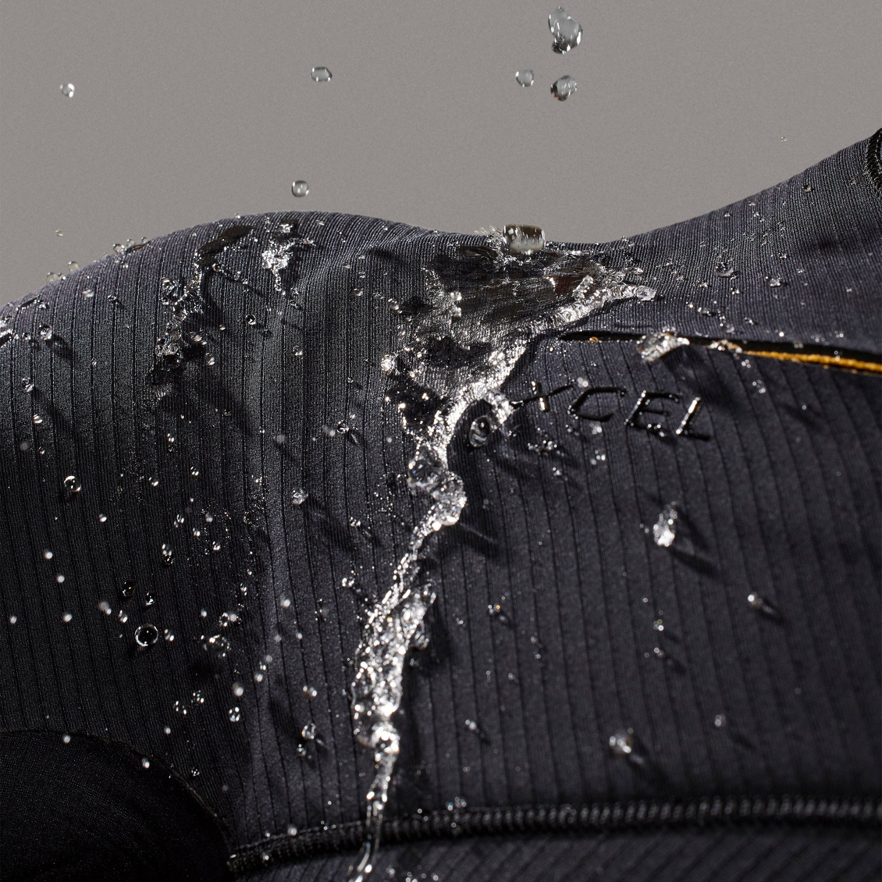 Close-up of Celliant Black front Zip in XCEL Drylock 5/4 mm wetsuit