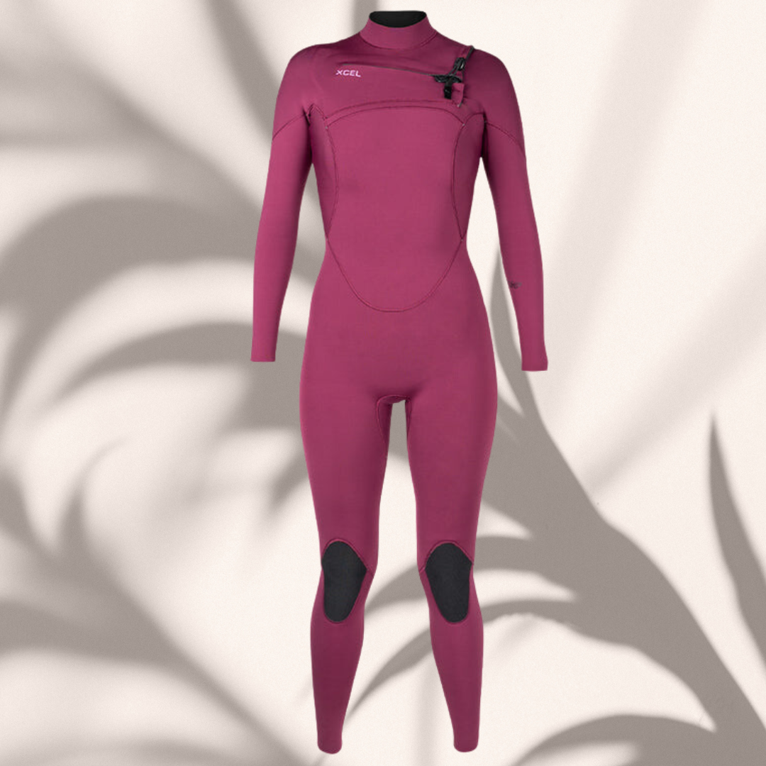 Woman wearing Xcel Comp 5/4mm wetsuit in cold water surfing conditions