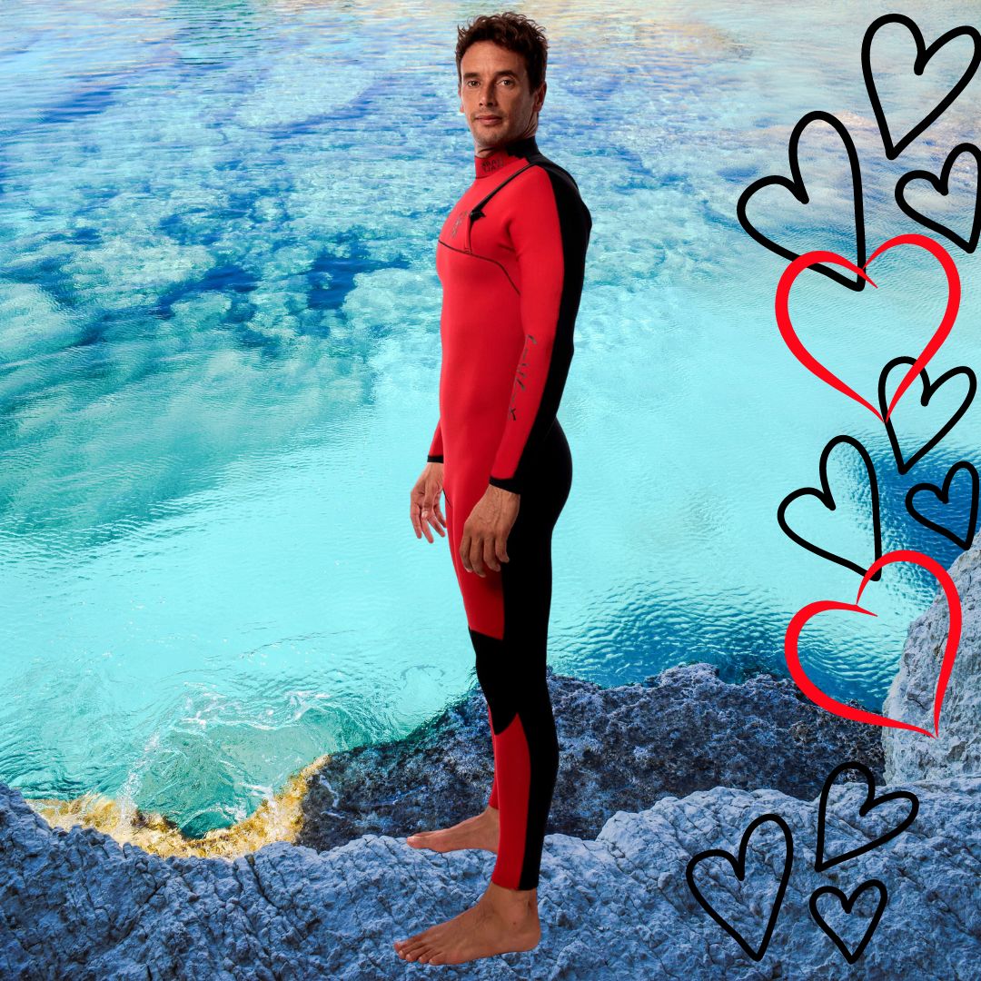 Side view– surfing in JANGA THE DARK HALF 4/3mm Red/Black wetsuit