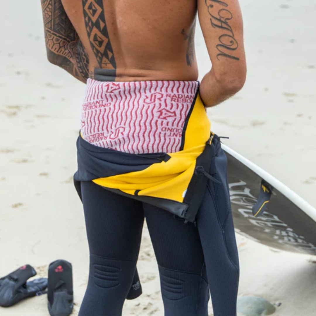 surfer wearning inWetsuit XCEL Infiniti Hooded  5/4mm 