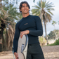 surfer in XCEL Comp Long Sleeve Jacket 1.5mm ME156CP5