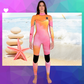 Woman wearing JANGA ALL STARS TIE DYE Multi color 3/2mm wetsuit in warm waters