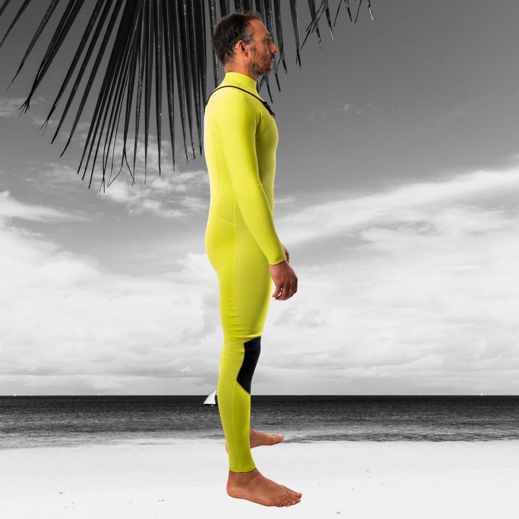 Surfer wearing JANGA FRONTLINE MAN 3/2mm wetsuit