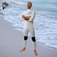 Surfer wearing Men's JANGA Firestarter 4/3mm wetsuit in white fire color