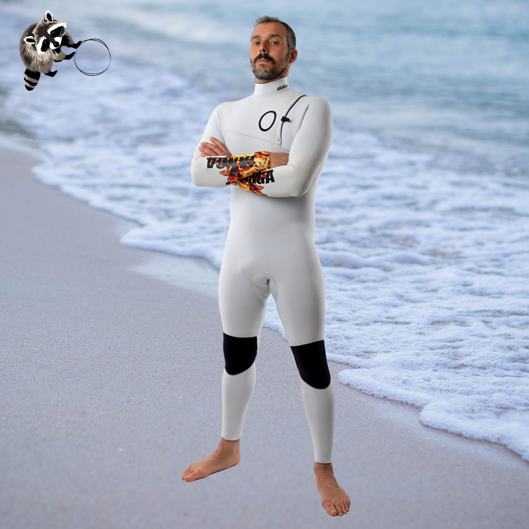 Surfer wearing Men's JANGA Firestarter 4/3mm wetsuit in white fire color